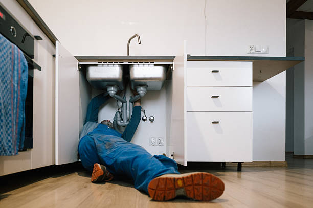 Professional Drain Cleaning technician working in Stotts City, MO